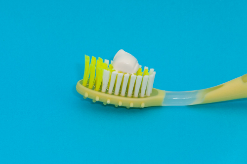 Toothpaste on a tooth brush
